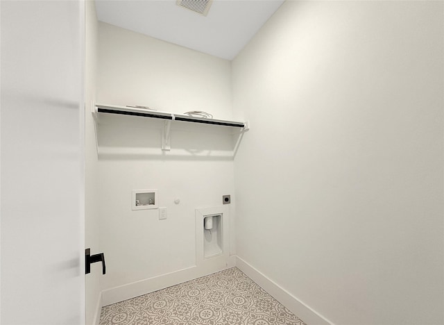 washroom with gas dryer hookup, baseboards, visible vents, laundry area, and washer hookup