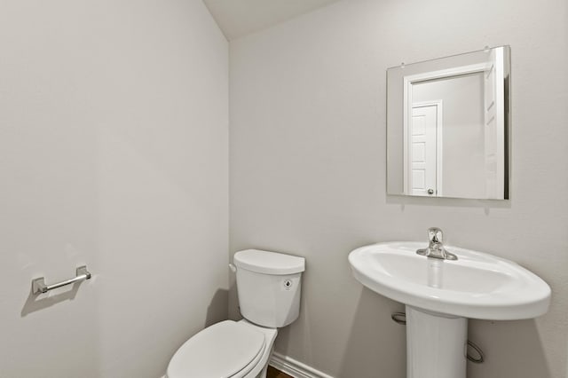 10569 Taruca Dr, Fort Worth, TX 76036 - half bathroom featuring toilet and baseboards