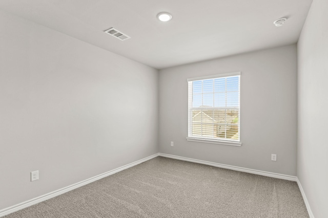 10569 Taruca Dr, Fort Worth, TX 76036 - carpeted spare room featuring baseboards and a smoke detector