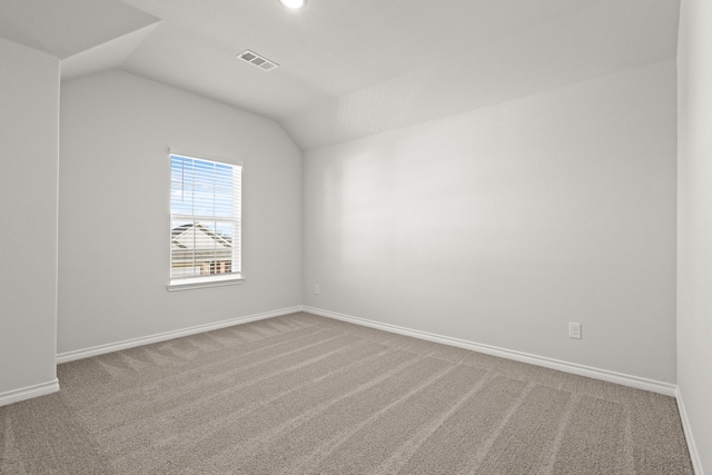 5025 Wellborn Rd, Fort Worth, TX 76036 - carpeted empty room featuring vaulted ceiling and baseboards
