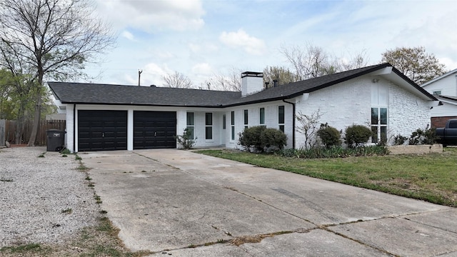 ranch-style home featuring driveway, a chimney, fence, an attached garage, and brick siding