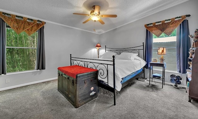 carpeted bedroom featuring multiple windows, a textured ceiling, and ornamental molding