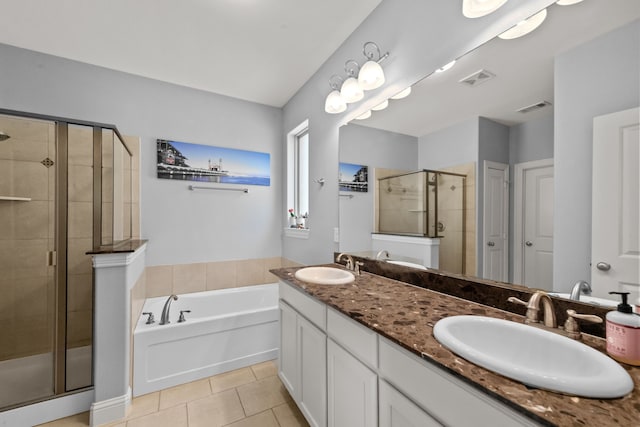 11317 Denet Creek Ln, Fort Worth, TX 76108 - bathroom with tile patterned flooring, visible vents, a sink, and a shower stall