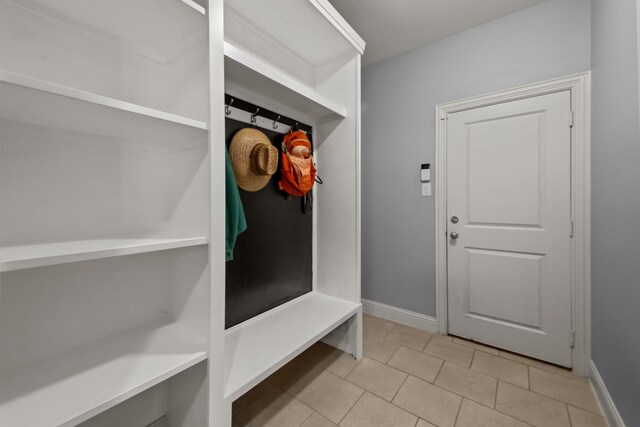 11317 Denet Creek Ln, Fort Worth, TX 76108 - mudroom with baseboards and light tile patterned floors