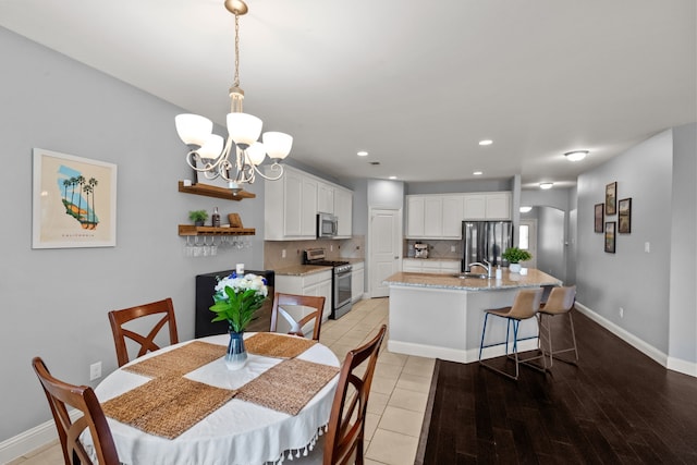 11317 Denet Creek Ln, Fort Worth, TX 76108 - dining room with recessed lighting, baseboards, and a notable chandelier