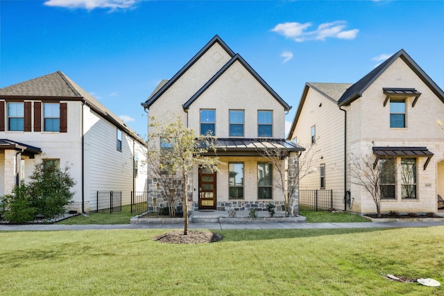 4126 Hap Arnold Mews, Frisco, TX 75034 - back of property with a lawn, a gate, fence, and a standing seam roof