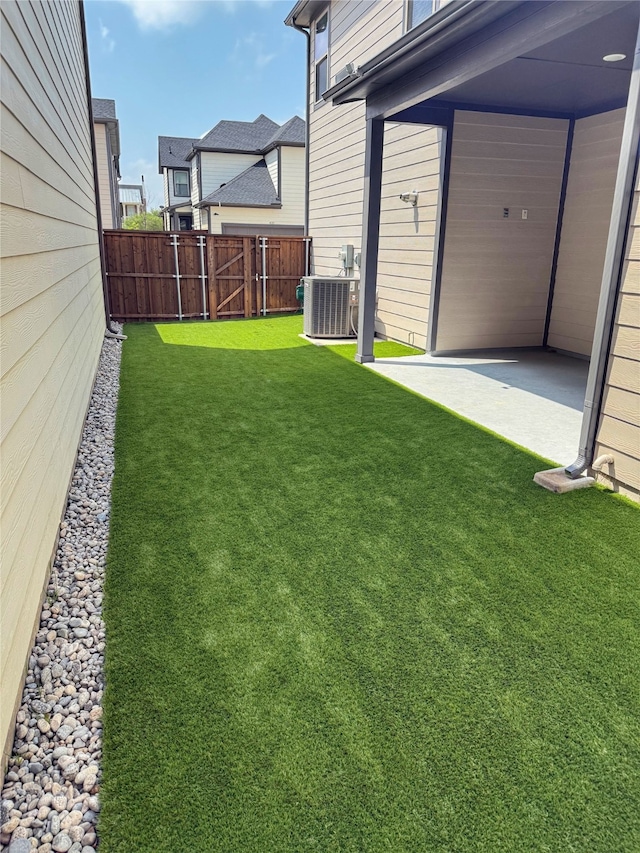 4126 Hap Arnold Mews, Frisco, TX 75034 - view of yard featuring a patio, fence, and central AC unit