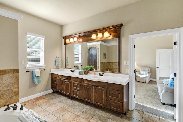 dining space featuring arched walkways, dark wood finished floors, baseboards, a chandelier, and ornamental molding
