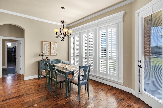office area featuring dark wood finished floors, a raised ceiling, visible vents, ornamental molding, and a notable chandelier