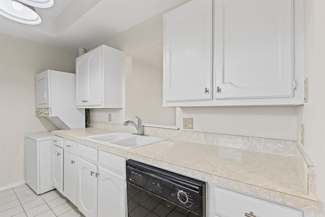 8511 Westover Ct Unit 217, Granbury, TX 76049 - kitchen featuring black dishwasher, a sink, white cabinets, light countertops, and light tile patterned floors