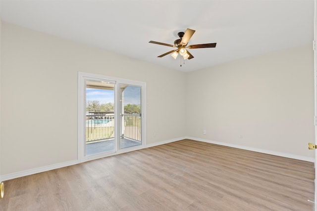 8511 Westover Ct Unit 217, Granbury, TX 76049 - unfurnished room featuring light wood-type flooring, ceiling fan, and baseboards