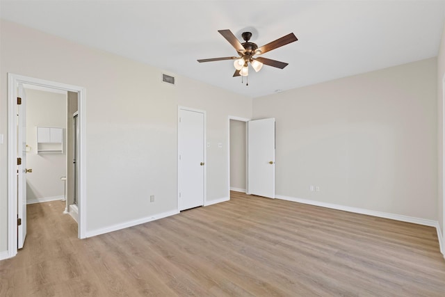 8511 Westover Ct Unit 217, Granbury, TX 76049 - unfurnished bedroom with light wood-type flooring, baseboards, and a ceiling fan