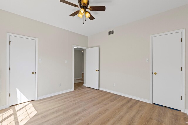 8511 Westover Ct Unit 217, Granbury, TX 76049 - unfurnished bedroom featuring light wood-style floors, baseboards, and a ceiling fan