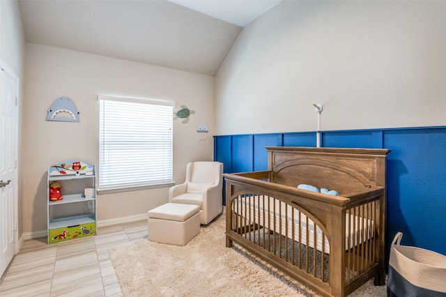 3721 Homeplace Dr, Celina, TX 75009 - bedroom featuring a crib, lofted ceiling, and light tile patterned floors