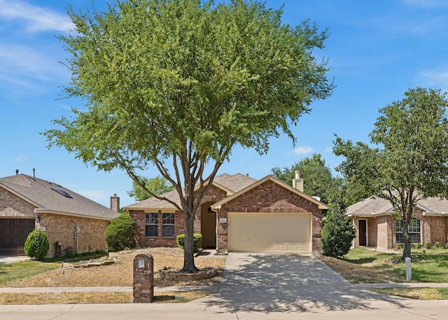 9304 Warren Dr, Mckinney, TX 75071 - view of front facade with brick siding, driveway, a garage, and a chimney