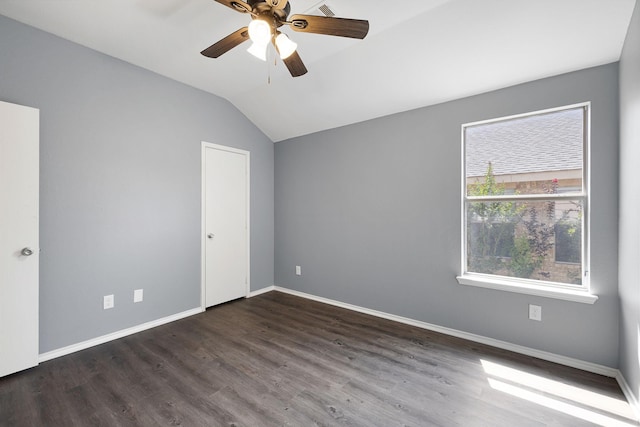 9304 Warren Dr, Mckinney, TX 75071 - empty room featuring baseboards, lofted ceiling, wood finished floors, and a ceiling fan