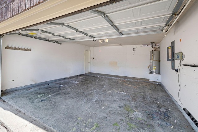 9304 Warren Dr, Mckinney, TX 75071 - garage with water heater and a garage door opener