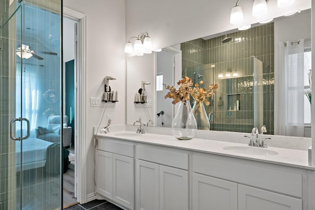 3640 Sevilla Dr, Frisco, TX 75034 - full bath with a stall shower, double vanity, healthy amount of natural light, and tile patterned flooring