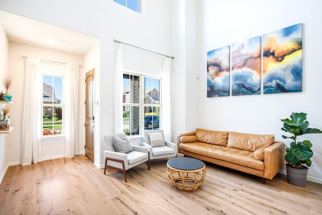 3640 Sevilla Dr, Frisco, TX 75034 - living room with wood finished floors and a towering ceiling