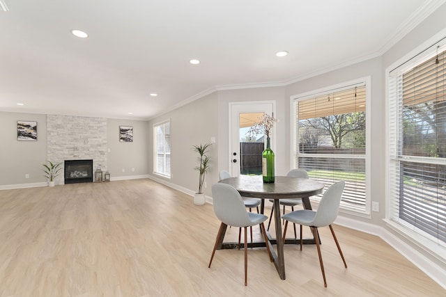 6313 Marvin Gdns, Mckinney, TX 75070 - dining area with light wood-style floors, healthy amount of natural light, baseboards, ornamental molding, and recessed lighting