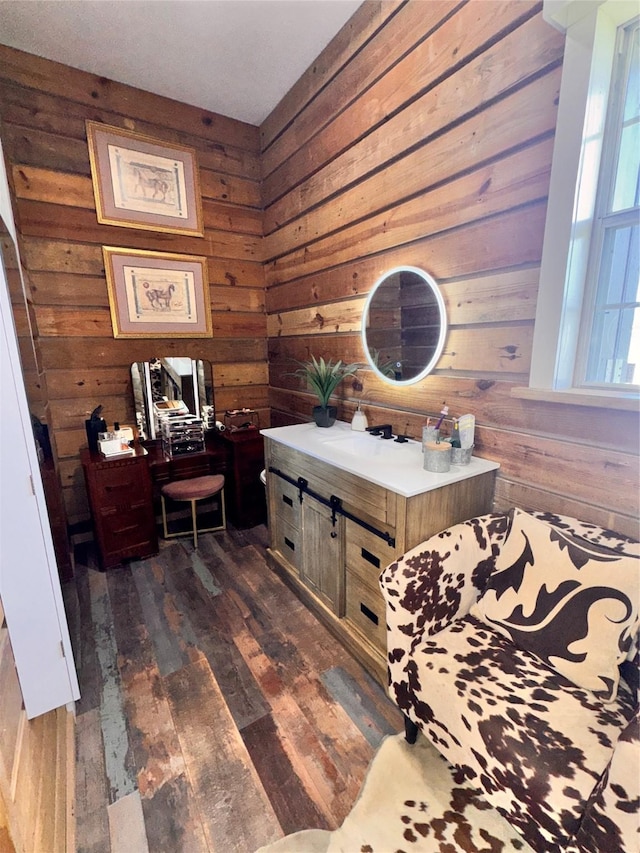 3163 Ranch Rd, Athens, TX 75751 - bathroom with wood walls, hardwood / wood-style floors, and vanity