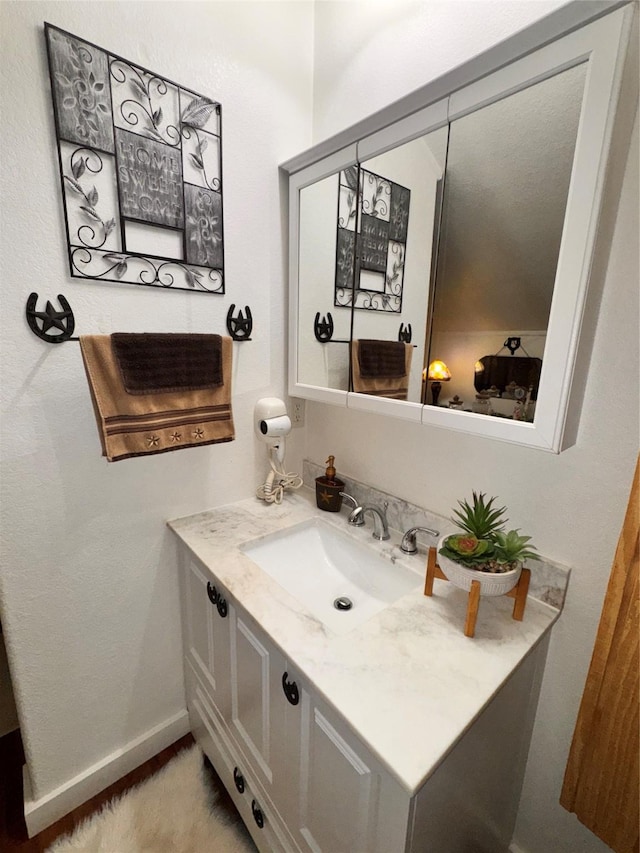 3163 Ranch Rd, Athens, TX 75751 - bathroom with vanity and baseboards