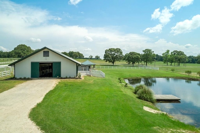 3163 Ranch Rd, Athens, TX 75751 - view of yard featuring a water view, an outbuilding, driveway, and a garage
