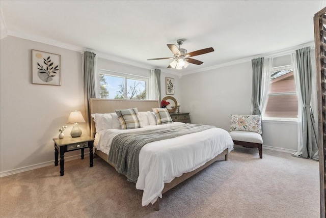 bedroom with light colored carpet, ornamental molding, baseboards, and a ceiling fan
