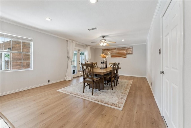 dining space with ornamental molding, ceiling fan, baseboards, light wood-style floors, and recessed lighting