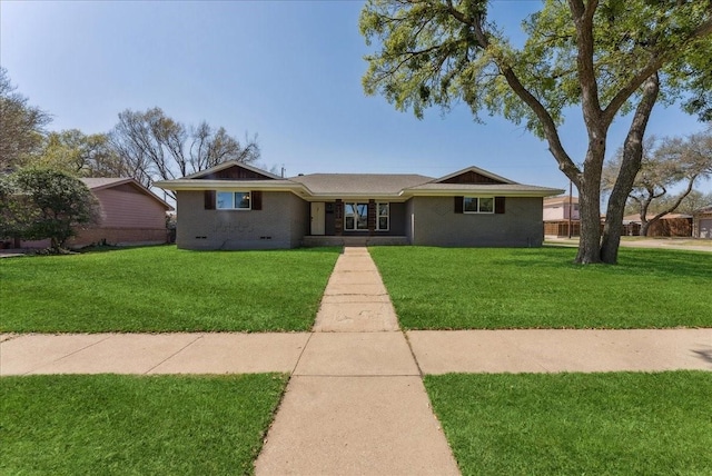 ranch-style home with a front lawn and brick siding