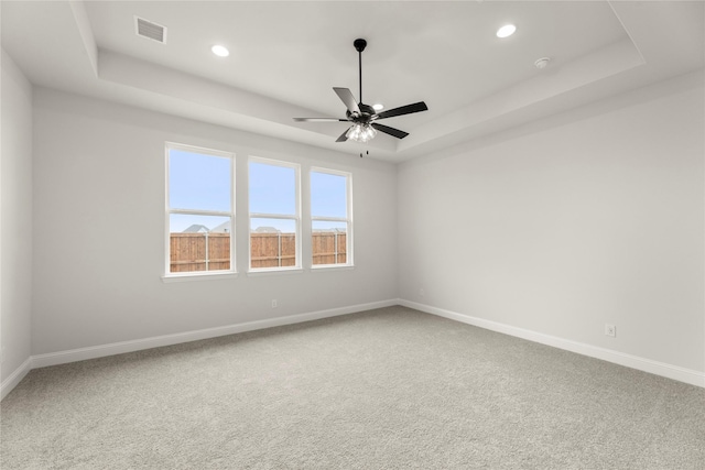 2109 Stratford Rd, Rockwall, TX 75087 - spare room featuring carpet, baseboards, a tray ceiling, recessed lighting, and ceiling fan