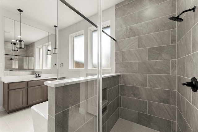 2109 Stratford Rd, Rockwall, TX 75087 - full bathroom featuring tiled shower, vanity, and tile patterned floors