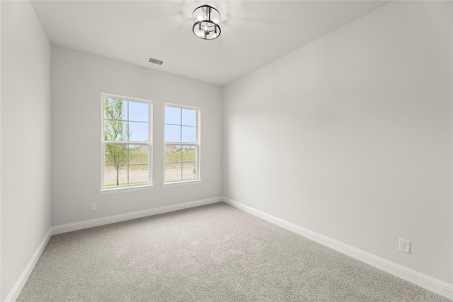 2109 Stratford Rd, Rockwall, TX 75087 - carpeted empty room with baseboards
