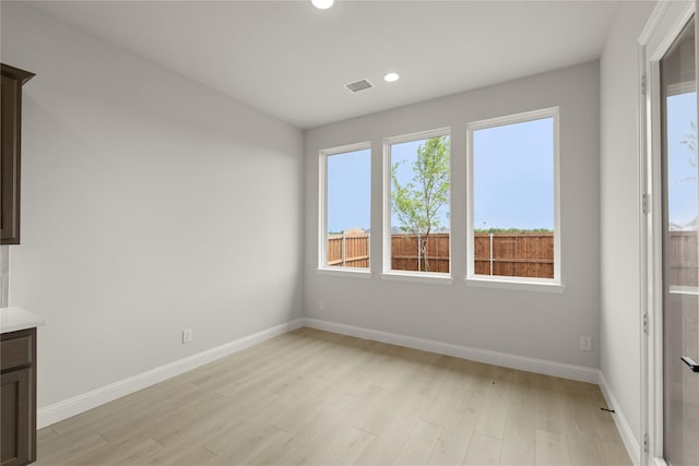 2109 Stratford Rd, Rockwall, TX 75087 - unfurnished room with light wood-style flooring, baseboards, and recessed lighting