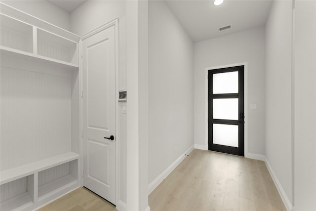 2109 Stratford Rd, Rockwall, TX 75087 - mudroom with light wood-style floors and baseboards