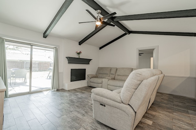 329 W Ferndale Ln, Grand Prairie, TX 75052 - living area with a ceiling fan, wood finished floors, vaulted ceiling with beams, and wainscoting