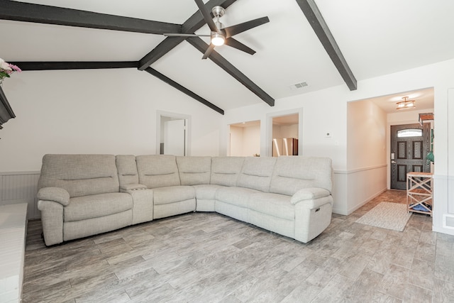 329 W Ferndale Ln, Grand Prairie, TX 75052 - living area with lofted ceiling with beams, a wainscoted wall, light wood-style floors, visible vents, and ceiling fan