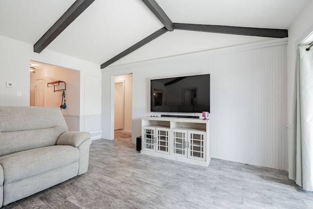 329 W Ferndale Ln, Grand Prairie, TX 75052 - living room with vaulted ceiling with beams and wood finished floors