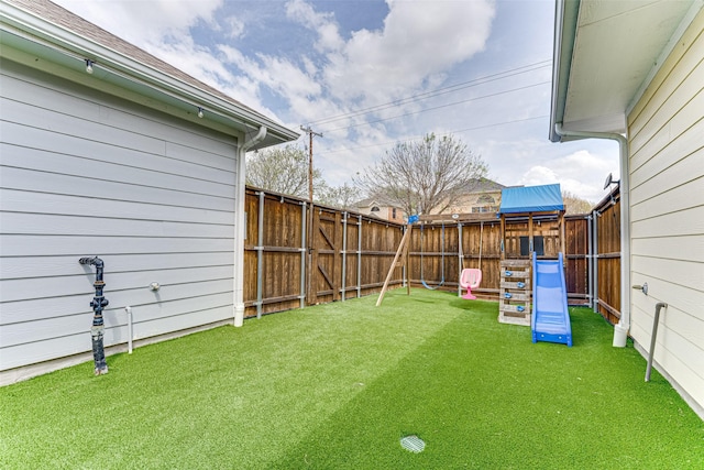 view of yard featuring a playground