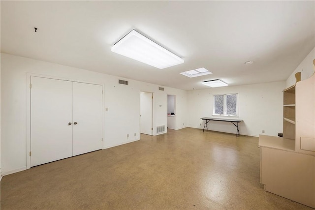 basement featuring visible vents