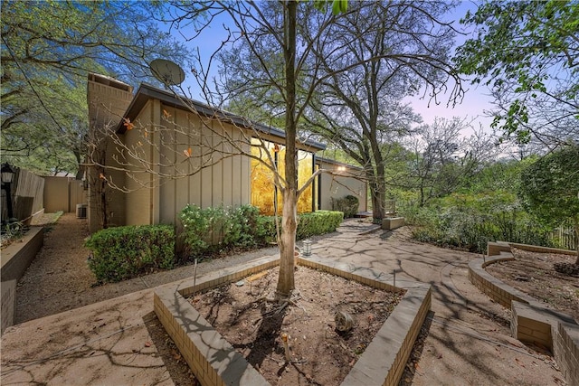 view of yard with fence and a patio area
