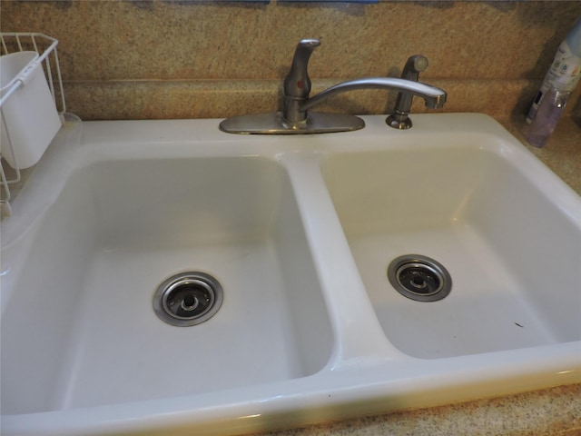 interior details featuring a sink