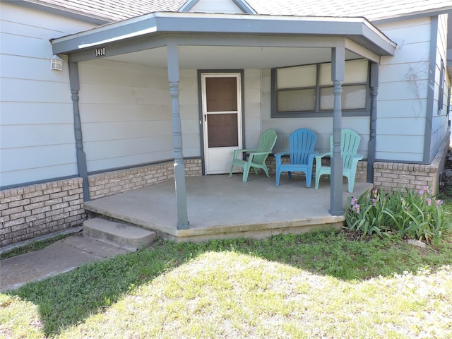 property entrance with covered porch