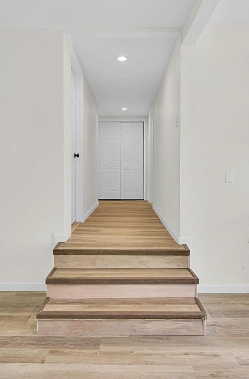 1541 Clark Ave, Waco, TX 76708 - stairs with baseboards, wood finished floors, and recessed lighting