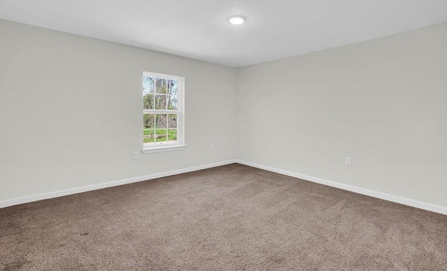 1541 Clark Ave, Waco, TX 76708 - unfurnished room with baseboards and dark colored carpet