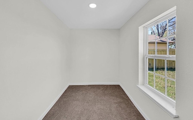 1541 Clark Ave, Waco, TX 76708 - empty room featuring baseboards, recessed lighting, carpet, and plenty of natural light