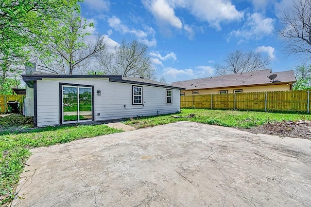 1541 Clark Ave, Waco, TX 76708 - rear view of property featuring a patio area and fence private yard