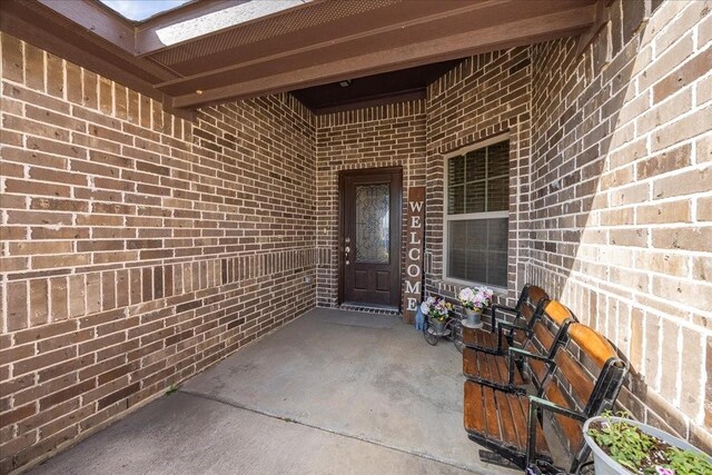 4711 Bering Dr, Sanger, TX 76266 - entrance to property featuring brick siding