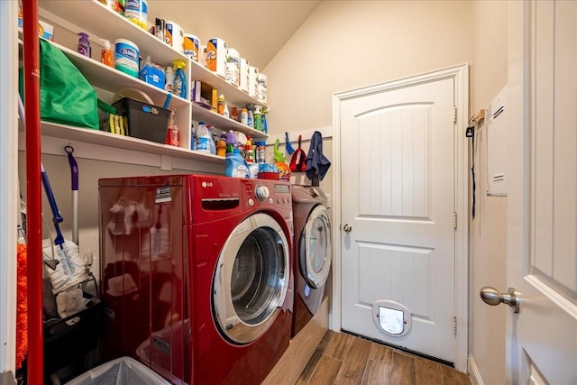4711 Bering Dr, Sanger, TX 76266 - washroom with washing machine and clothes dryer and wood finished floors