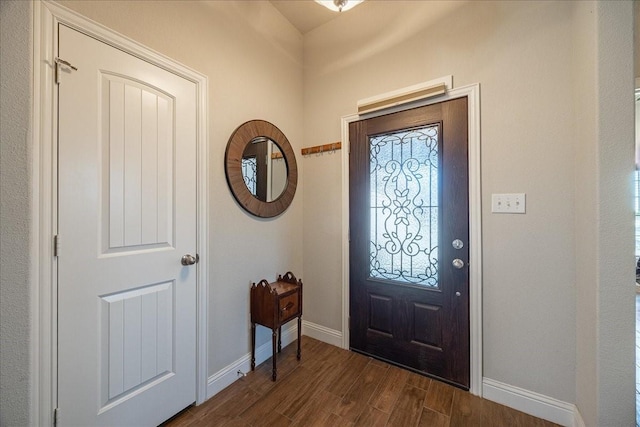 4711 Bering Dr, Sanger, TX 76266 - entryway with dark wood finished floors and baseboards